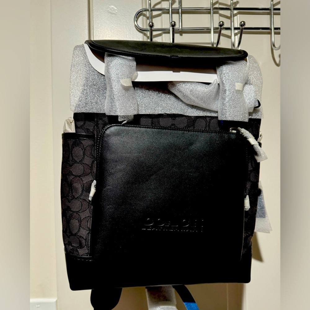 NEW- Coach Back Pack. Never used!